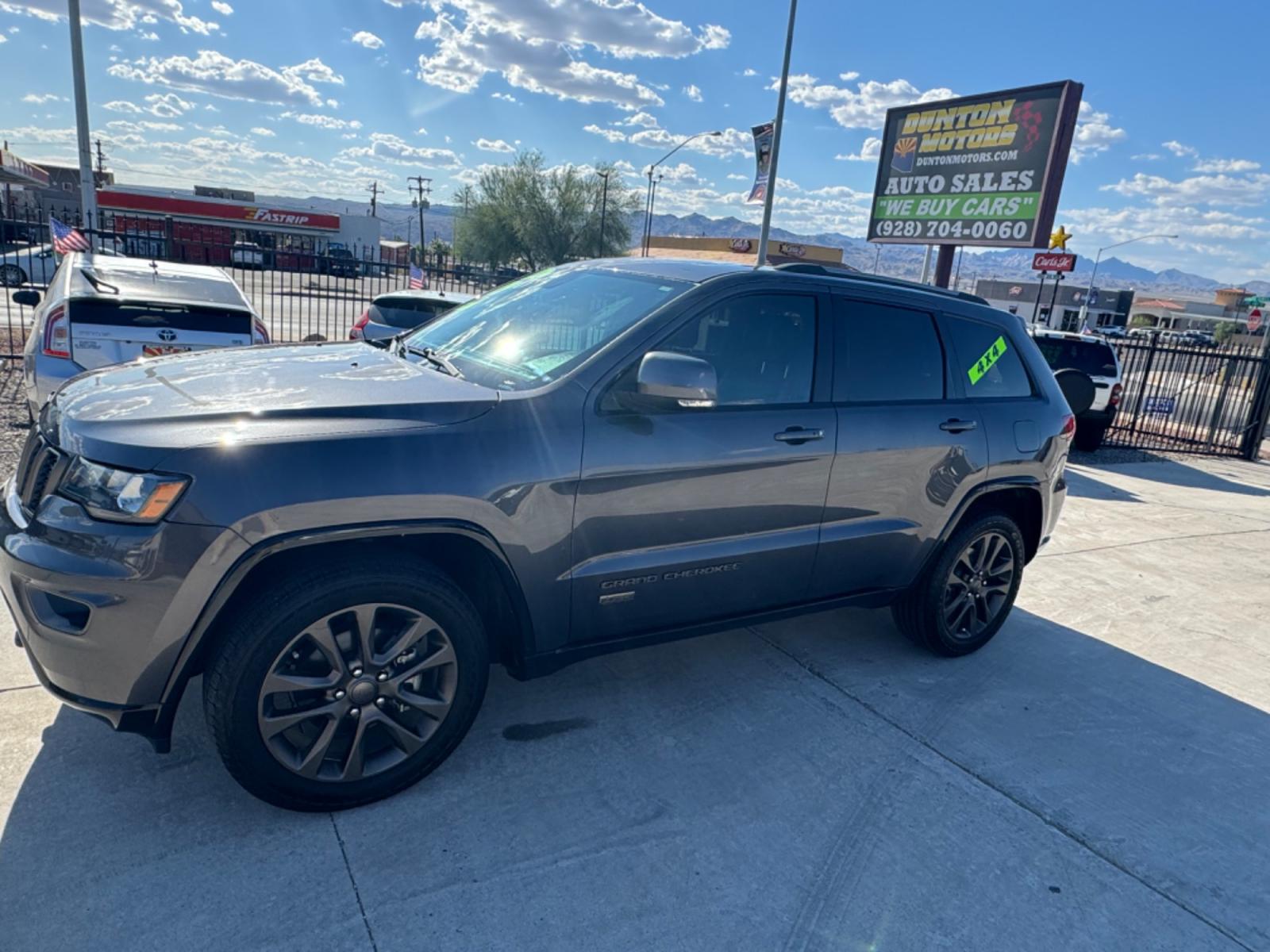 2016 grey Jeep Grand Cherokee (1C4RJFBG0GC) , located at 2190 Hwy 95, Bullhead City, AZ, 86442, (928) 704-0060, 0.000000, 0.000000 - 75th anniversary edition. clean carfax. jeep grand cherokee limited 4 wd. Leather loaded. 81k miles. free and clear title. - Photo #7